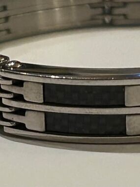 Unsigned men’s stainless steel bracelet with black accents